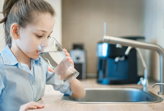 child drinking water