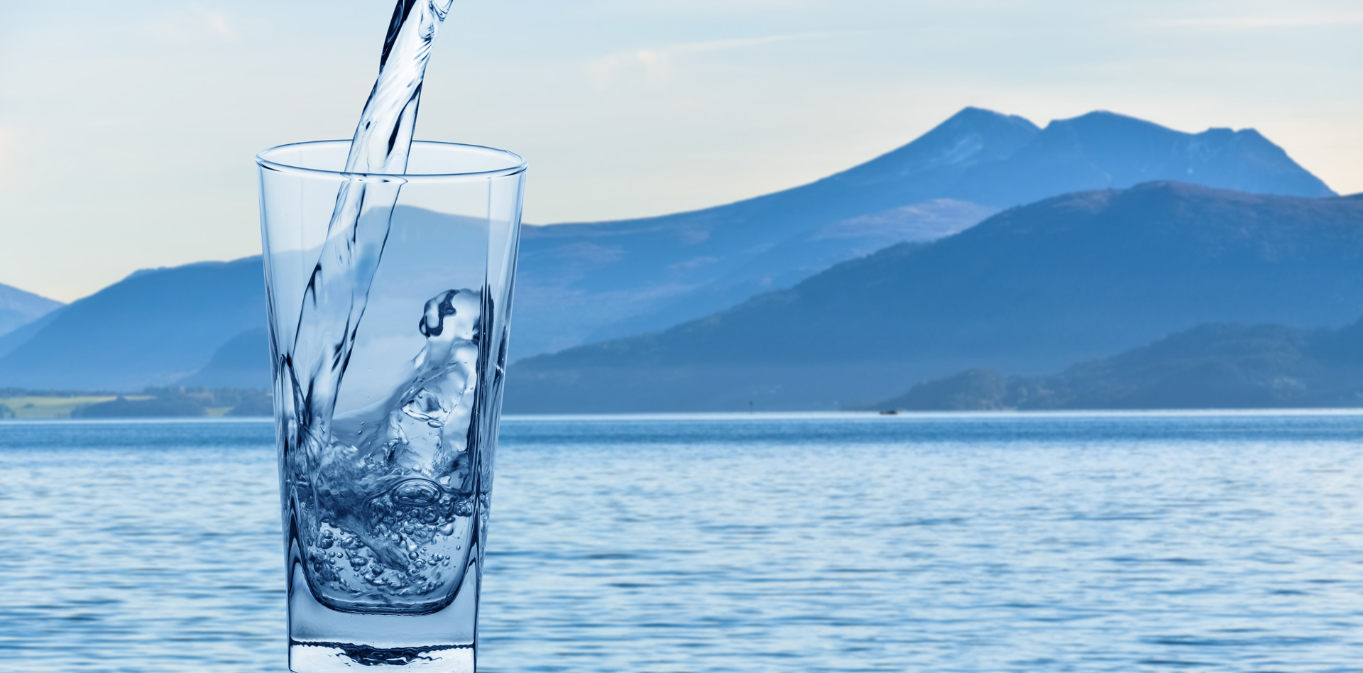 glass of water on lake